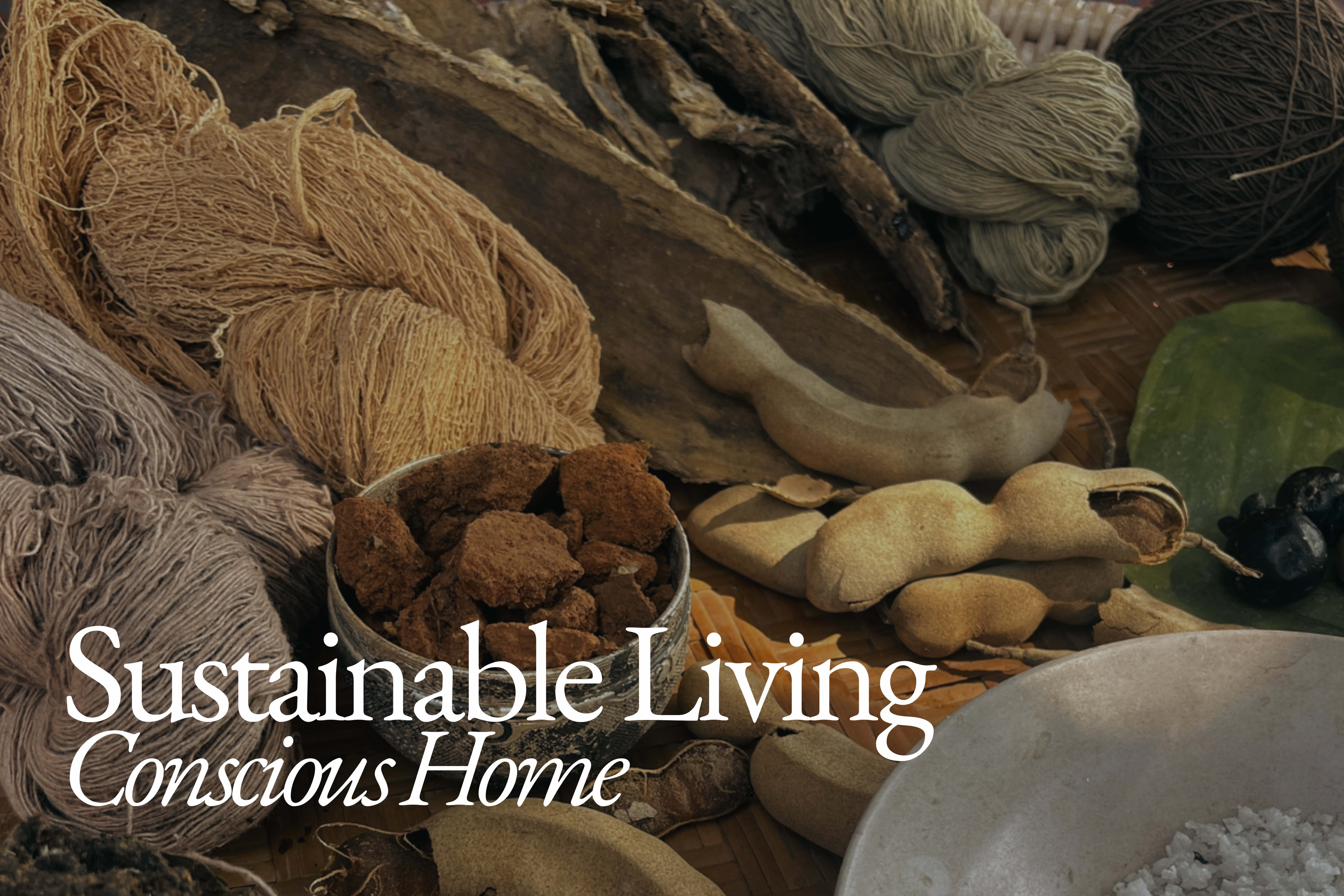A collection of natural materials, plant-based dyes, and colourful yarn fibres prepared for traditional textile production.