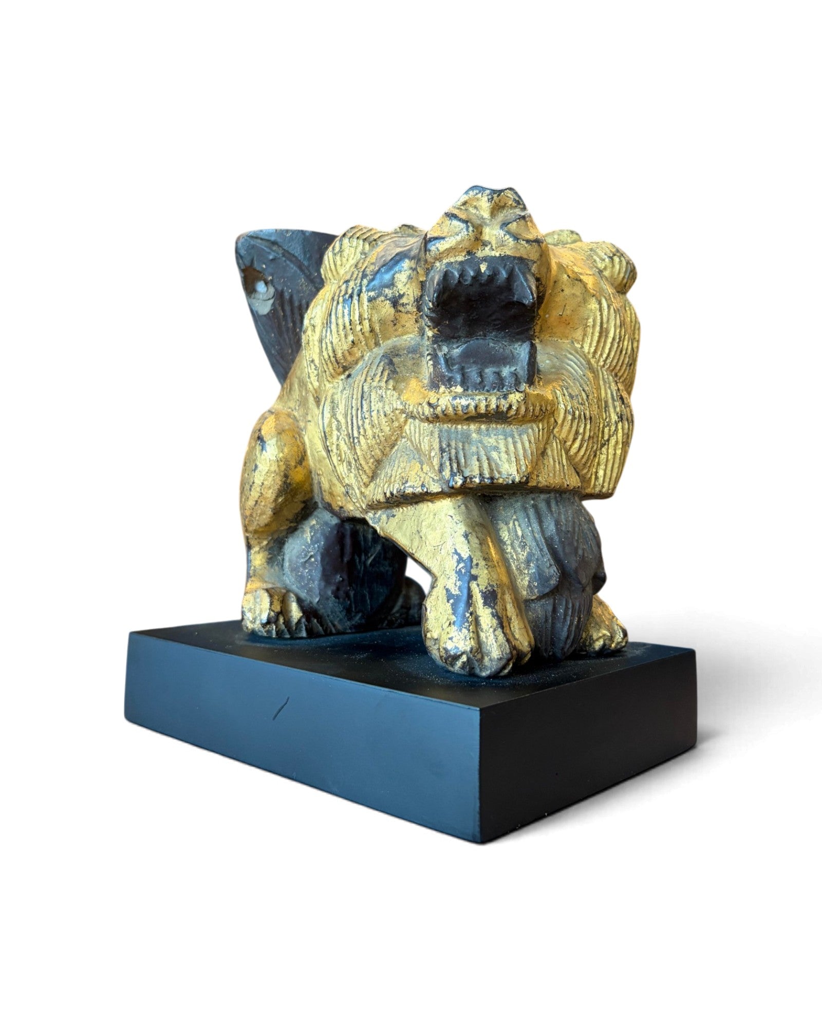Carved Wooden Lion embellished with Gold Leaf (สิงโตไม้ติดทอง)