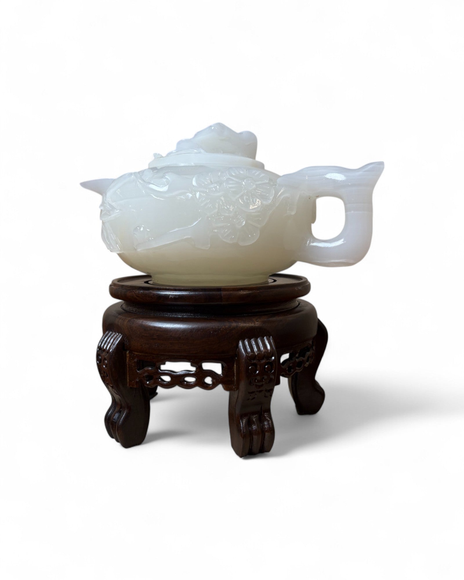 Chinese Carved White Jade Teapot with Floral Relief (with Stand)