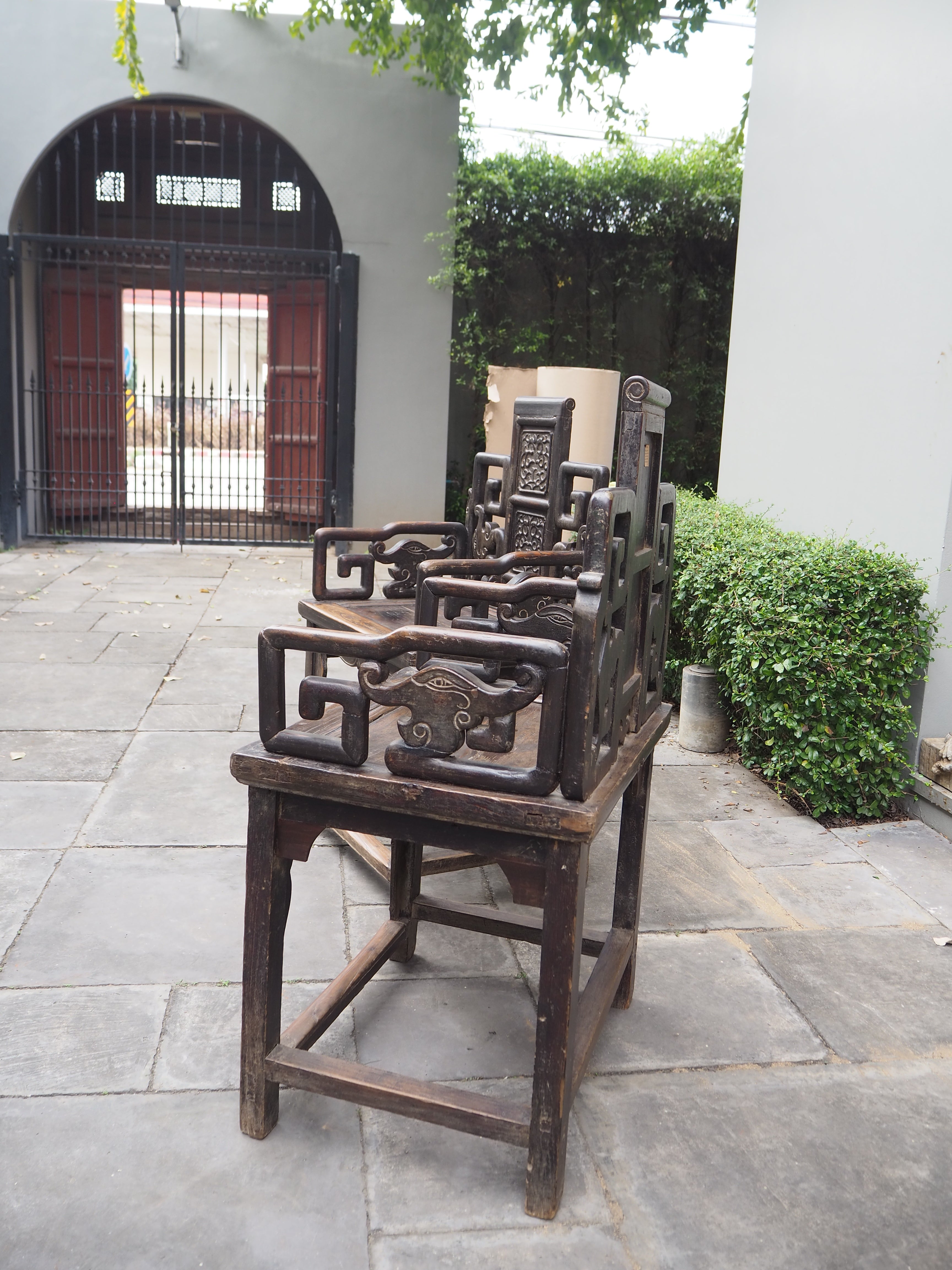 Mid Qing Dynasty Black Elm Lacquered Zhuo Vine Armchairs - Set of 2
