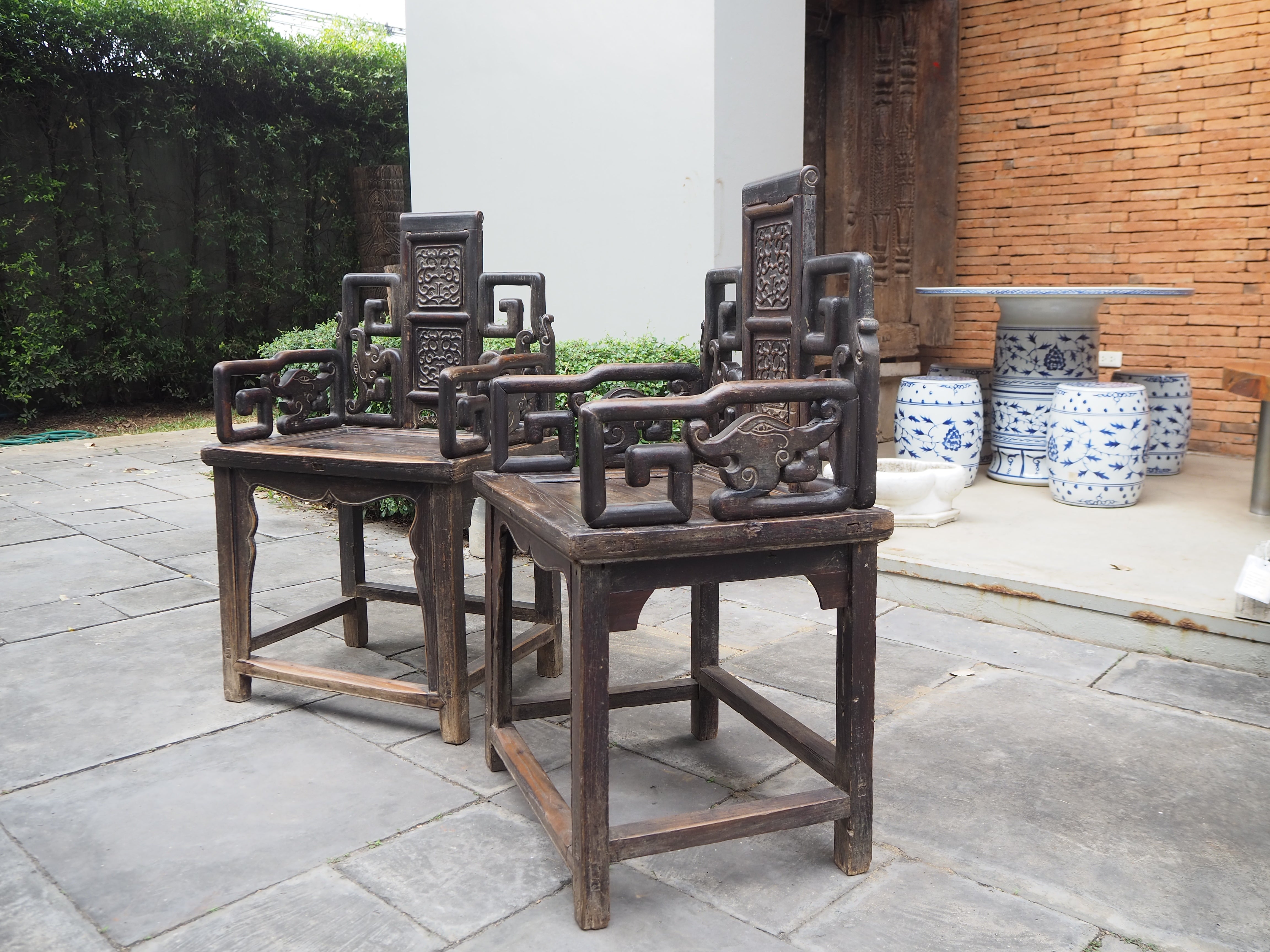 Mid Qing Dynasty Black Elm Lacquered Zhuo Vine Armchairs - Set of 2