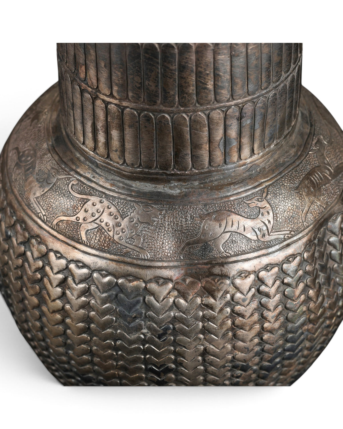 Antique Silver Jug Featuring Intricate Repoussé Decoration and a Heart Patterned Design