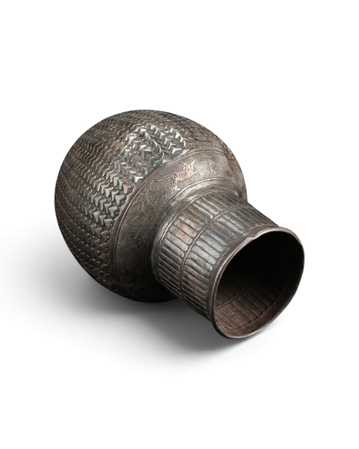 Antique Silver Jug Featuring Intricate Repoussé Decoration and a Heart Patterned Design