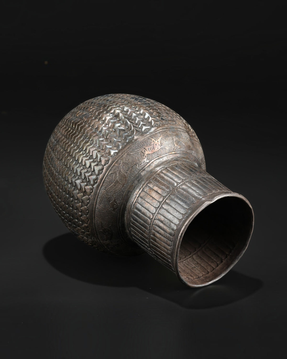Antique Silver Jug Featuring Intricate Repoussé Decoration and a Heart Patterned Design