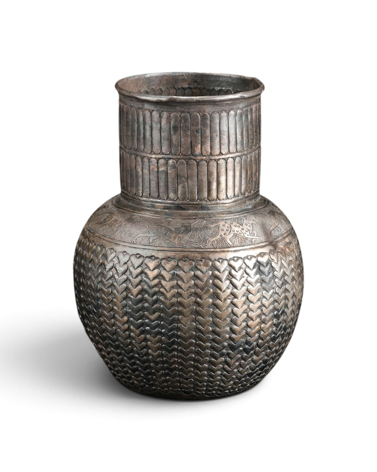 Antique Silver Jug Featuring Intricate Repoussé Decoration and a Heart Patterned Design