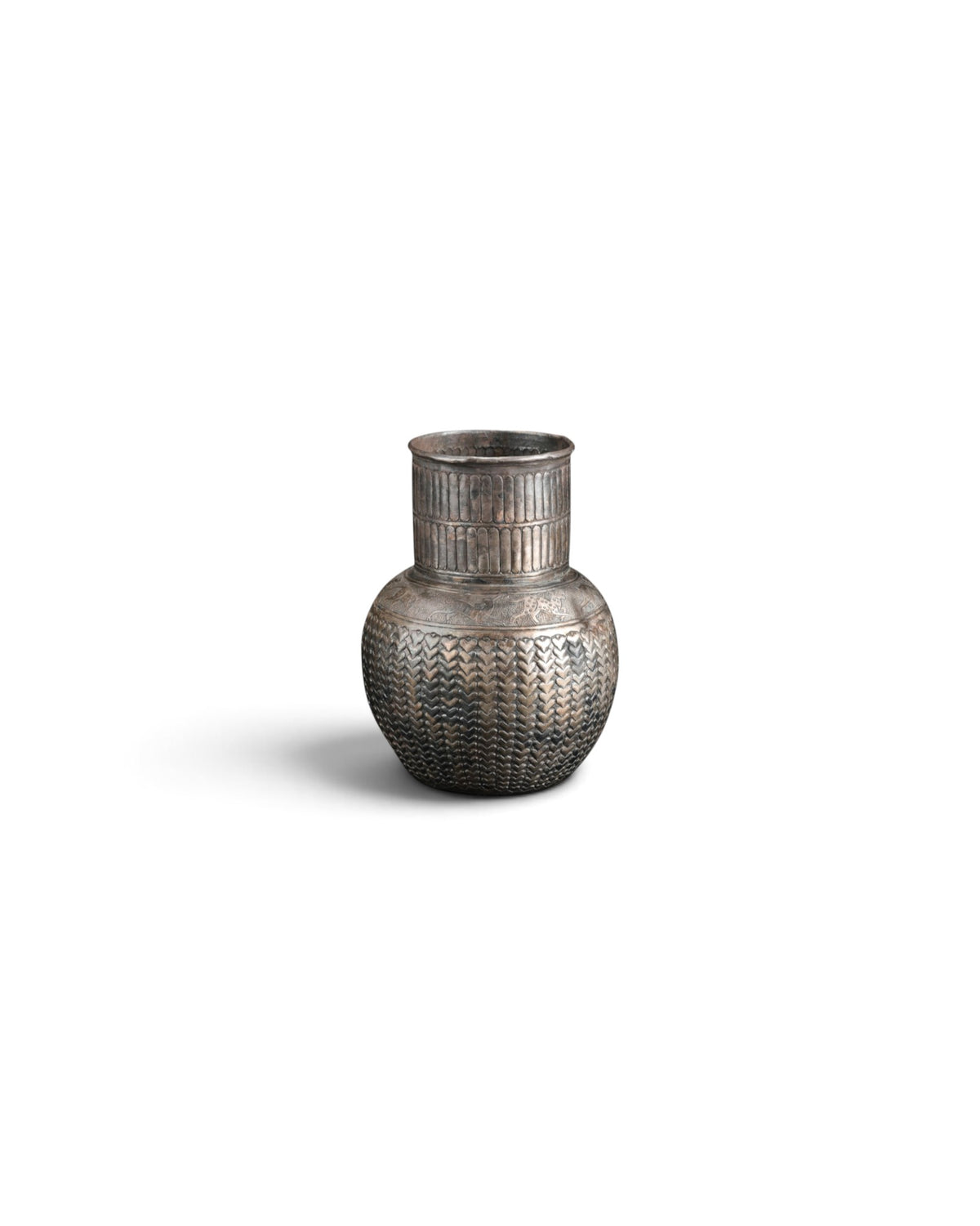 Antique Silver Jug Featuring Intricate Repoussé Decoration and a Heart Patterned Design