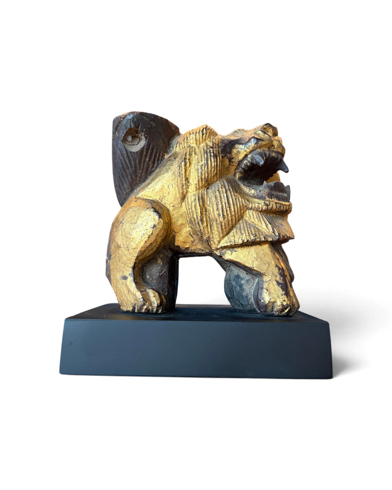 Carved Wooden Lion embellished with Gold Leaf (สิงโตไม้ติดทอง)