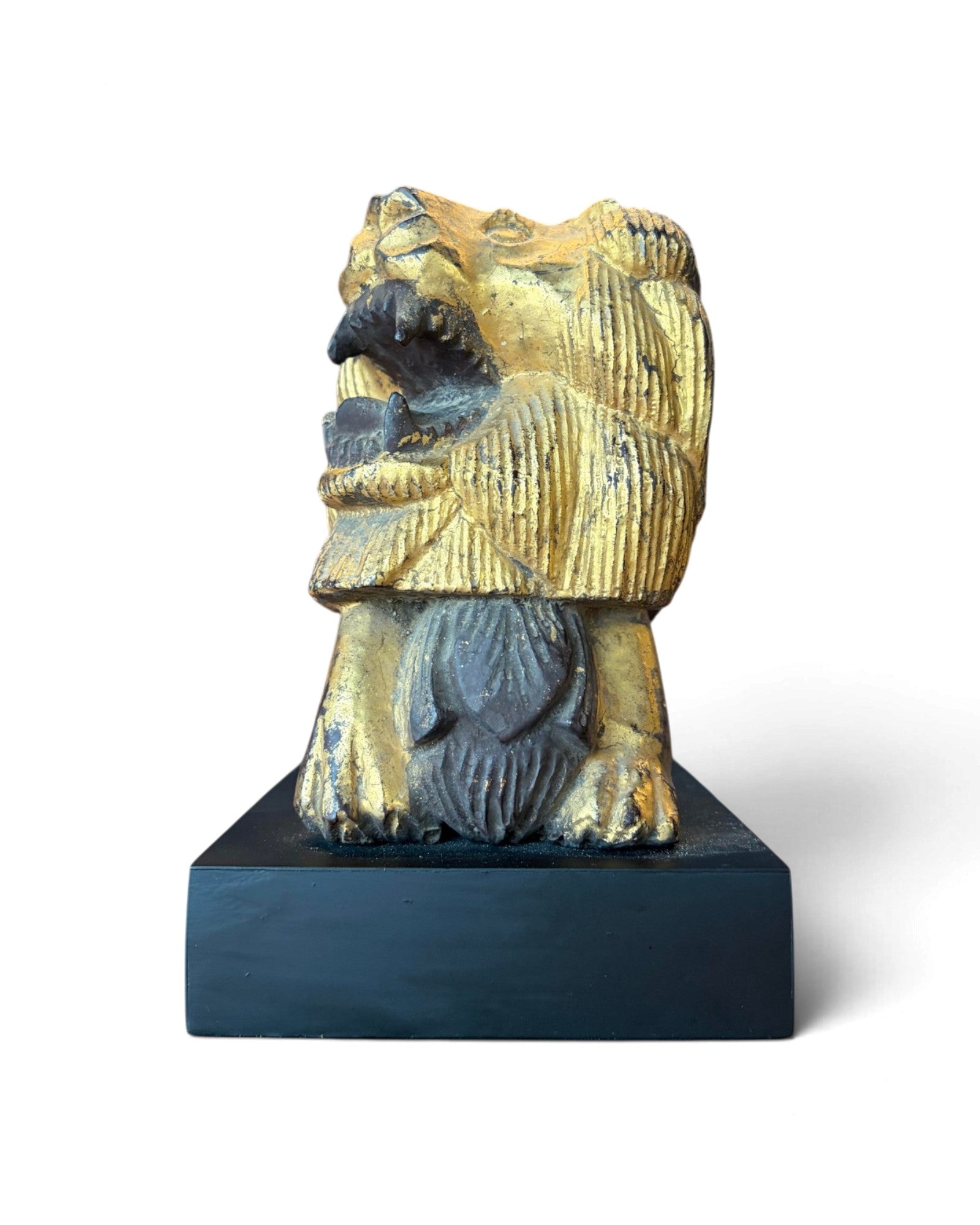 Carved Wooden Lion embellished with Gold Leaf (สิงโตไม้ติดทอง)