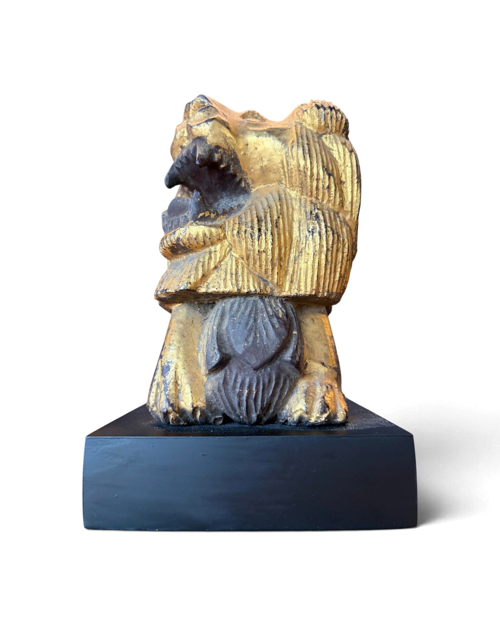 Carved Wooden Lion embellished with Gold Leaf (สิงโตไม้ติดทอง)
