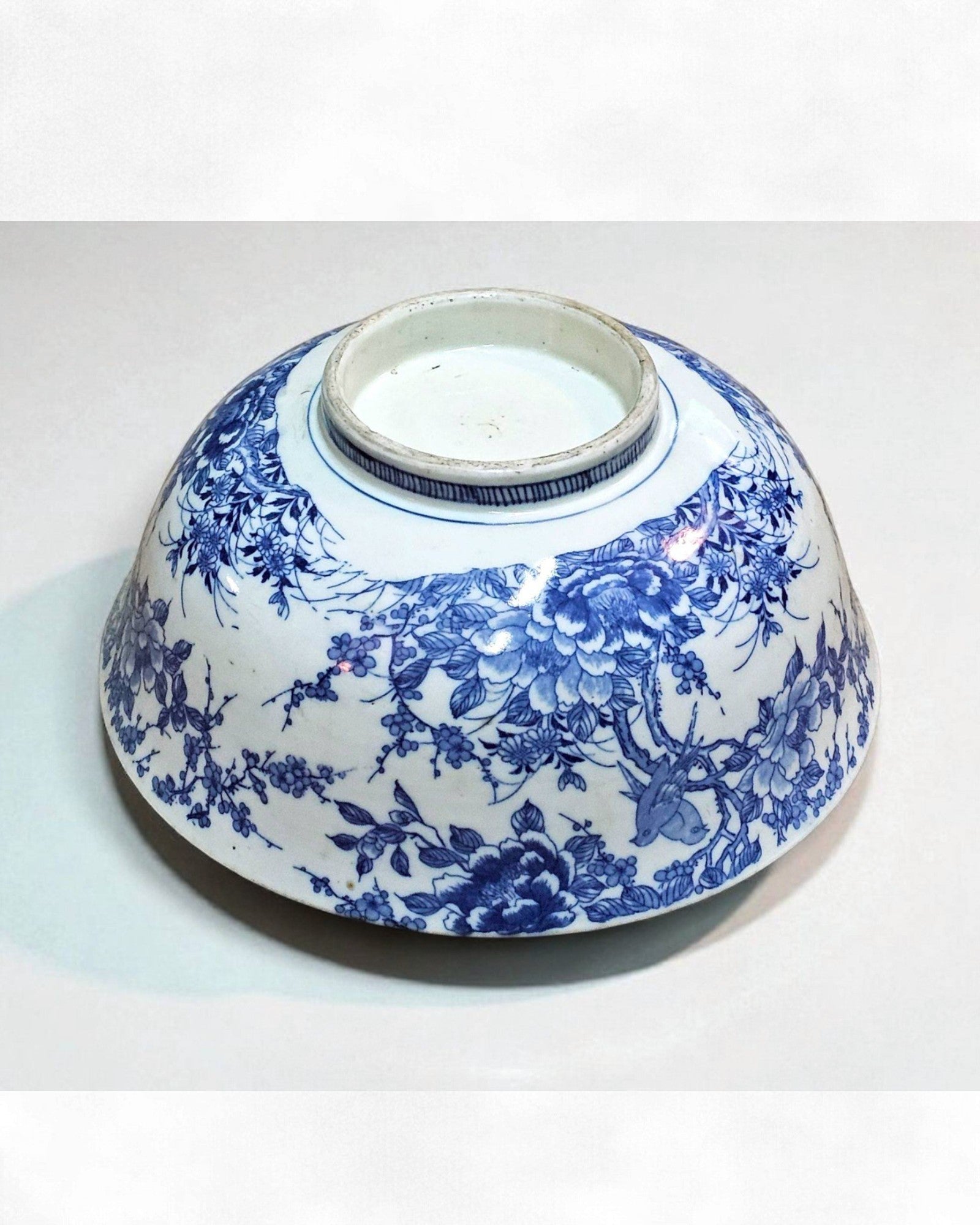 Blue and White Ceramic Bowl with Floral & Bird Motifs