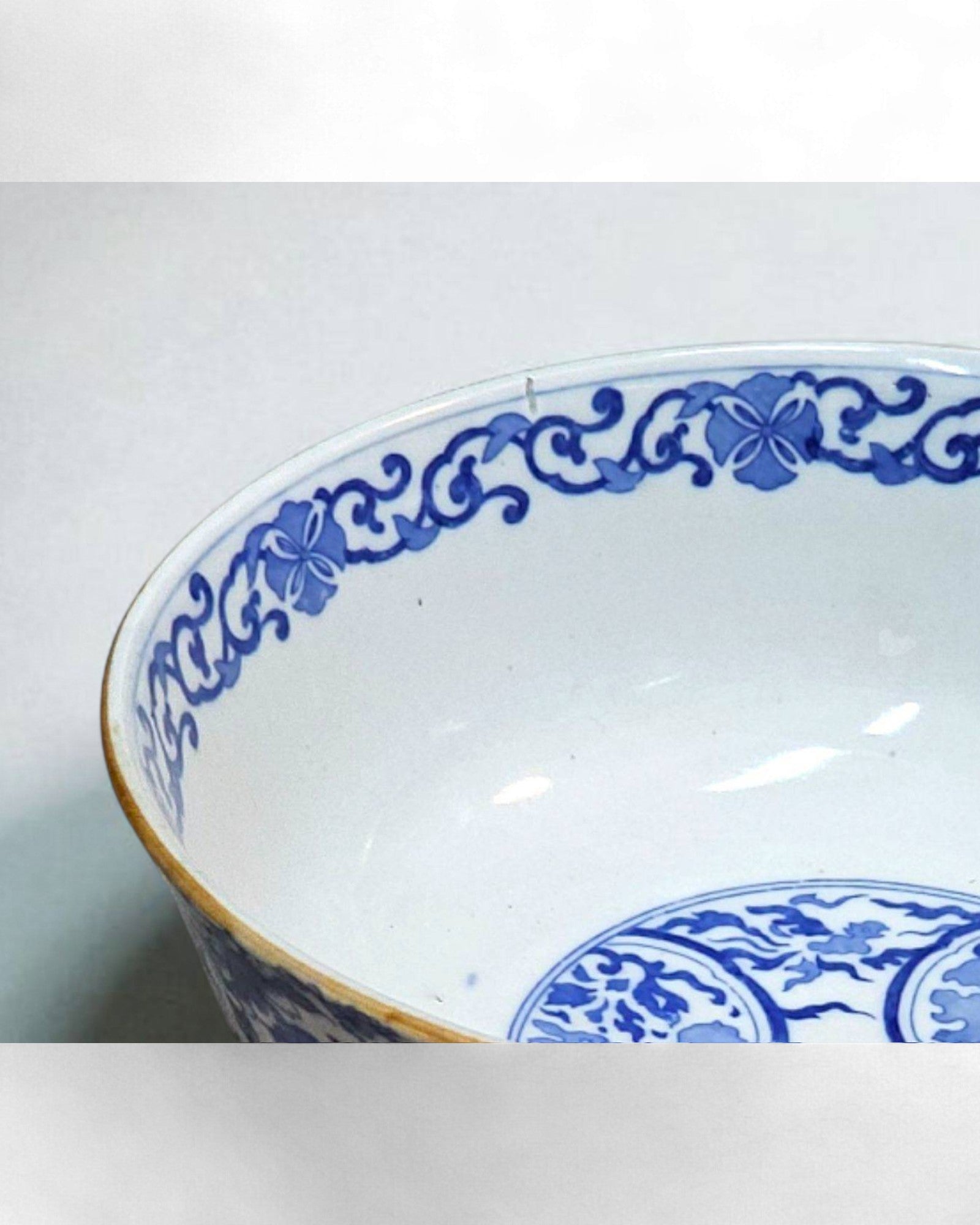 Blue and White Ceramic Bowl with Floral & Bird Motifs