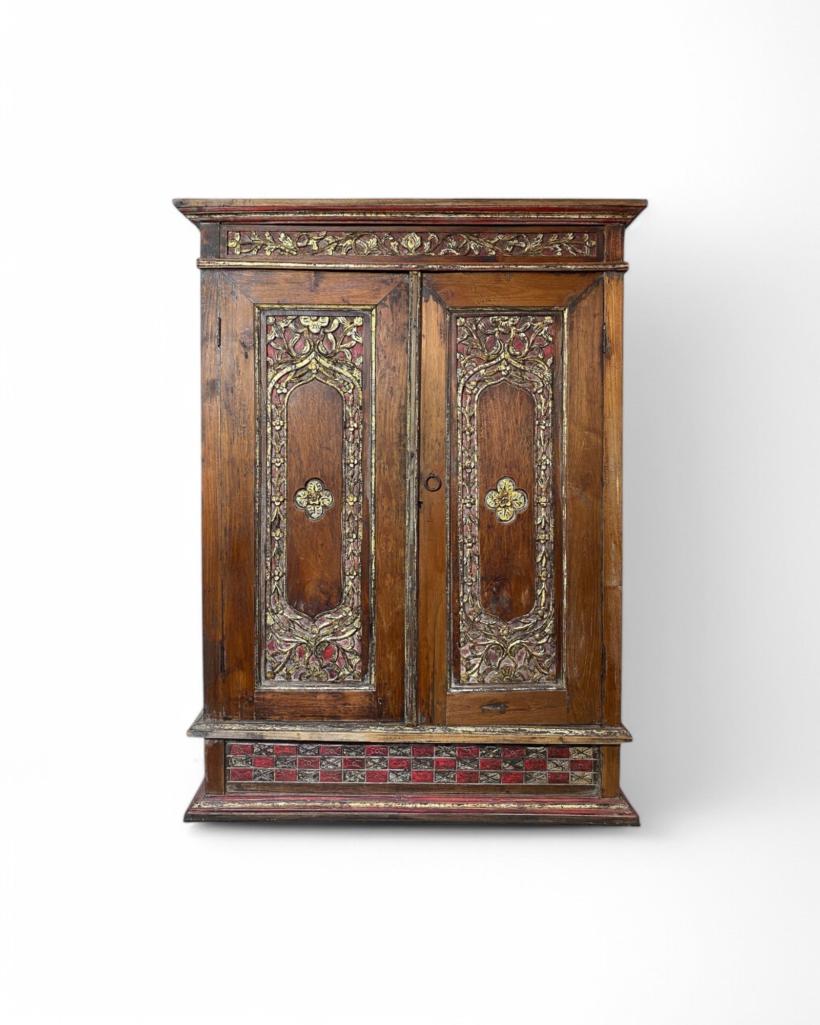 Ornate hand carved double door wardrobe with gold painted floral and vine detailing