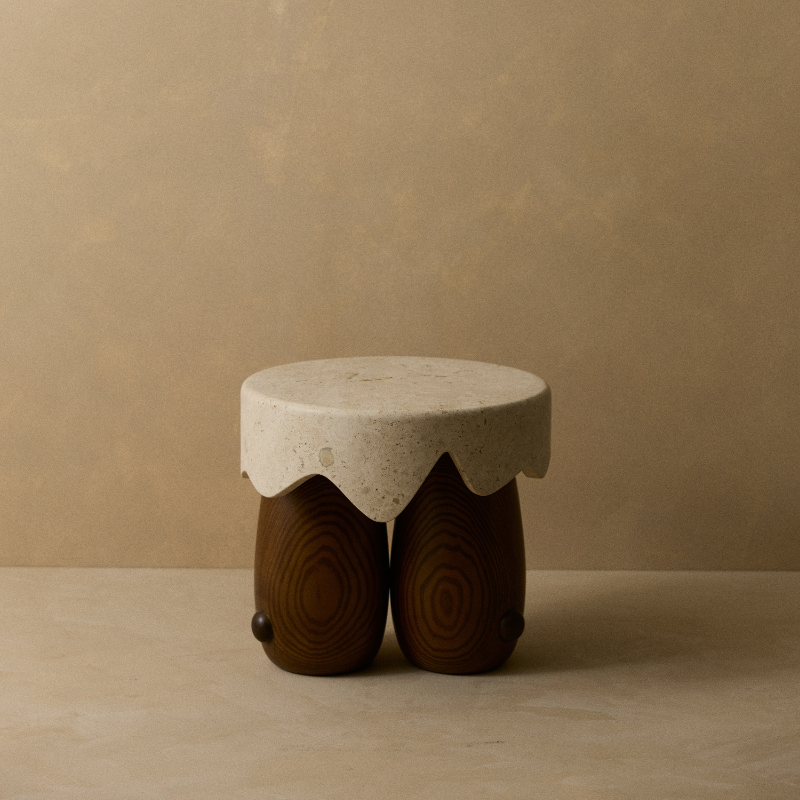 Stool with wooden base and concrete top on a beige background